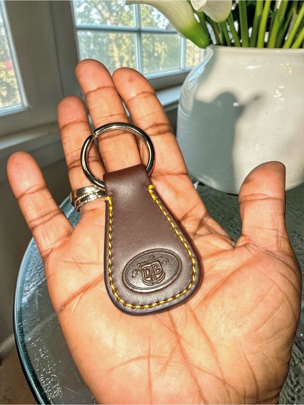 Dooney & Bourke Brown Leather Key Fob with Yellow Stitching